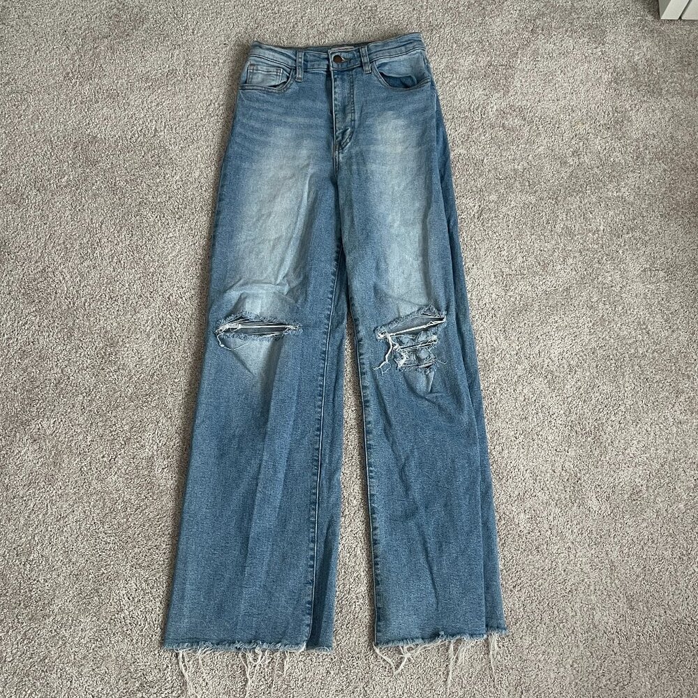 Vibrant Blue Jeans with Knee Rips